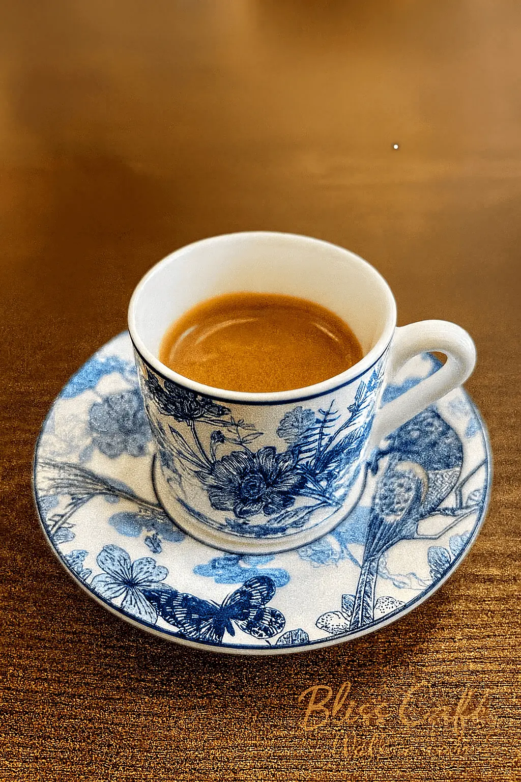Espresso in blue and white patterned cup at Bliss Café, a Coffee Shop in Oviedo